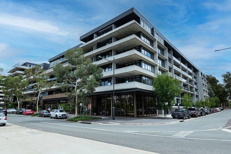 Why are people investing in apartments in Canberra?